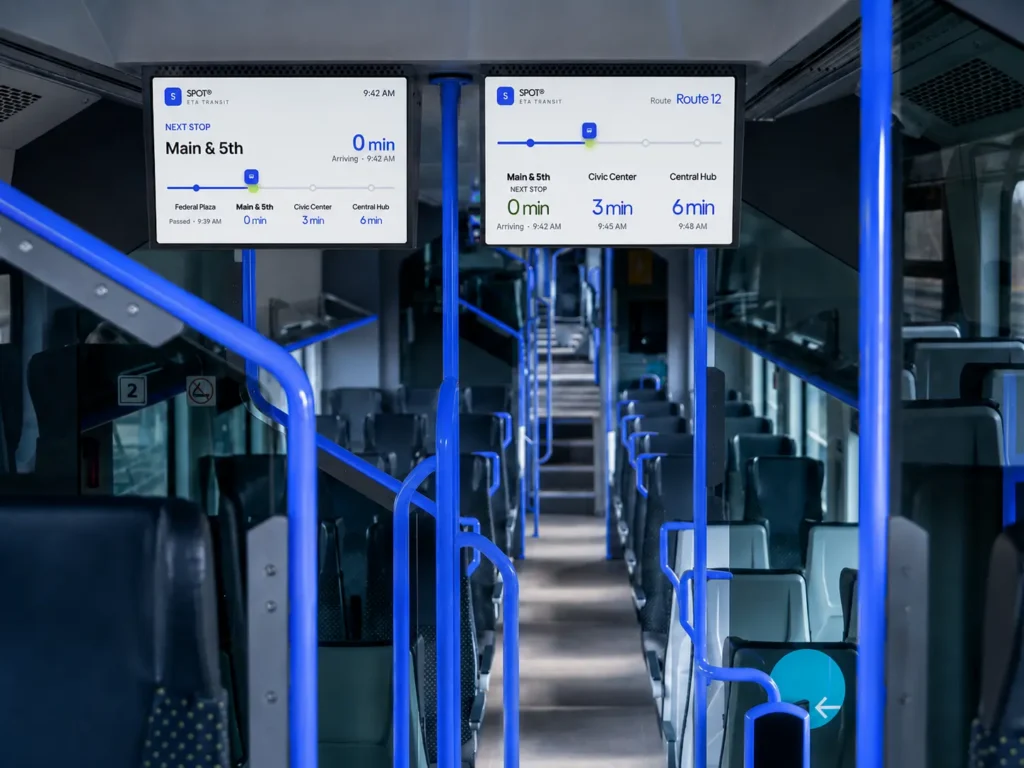 A Modern City Bus Interior With A Large Onboard Lcd Infotainment Screen Displaying A Real Time Transit Map Eta