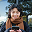 beautiful korean girl student bus stop looking her smartphone checking timetable